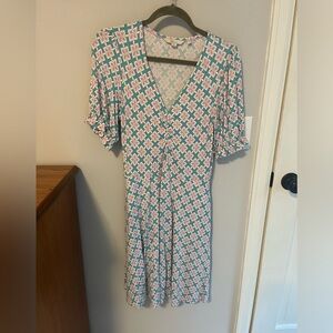 Boden knee length knit dress with pockets.